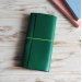 Green leather trifold Sterling Ink cover