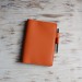 Orange leather Stalogy cover